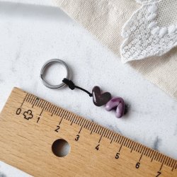 personalisierbarer Schlüsselanhänger mit zwei Herzen